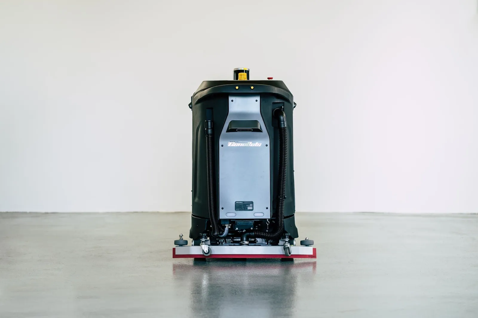 CenoBots L3 rear view with squeegee on a wet floor